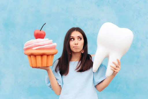 The Sweet Truth About Cavities: Exploring the Relationship between Sugar and Dental Health | Dentist Near Me